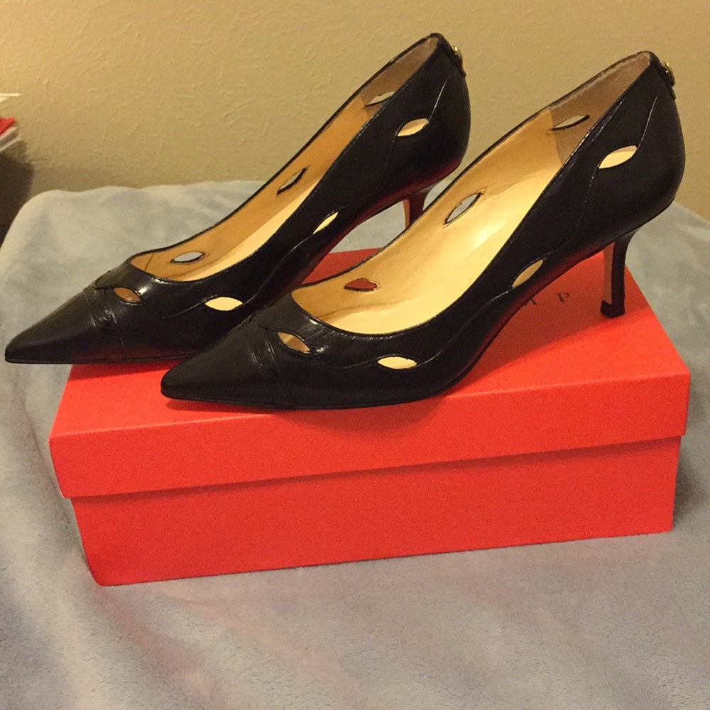 Brand new ...   IVANKA TRUMP multi leather 👠